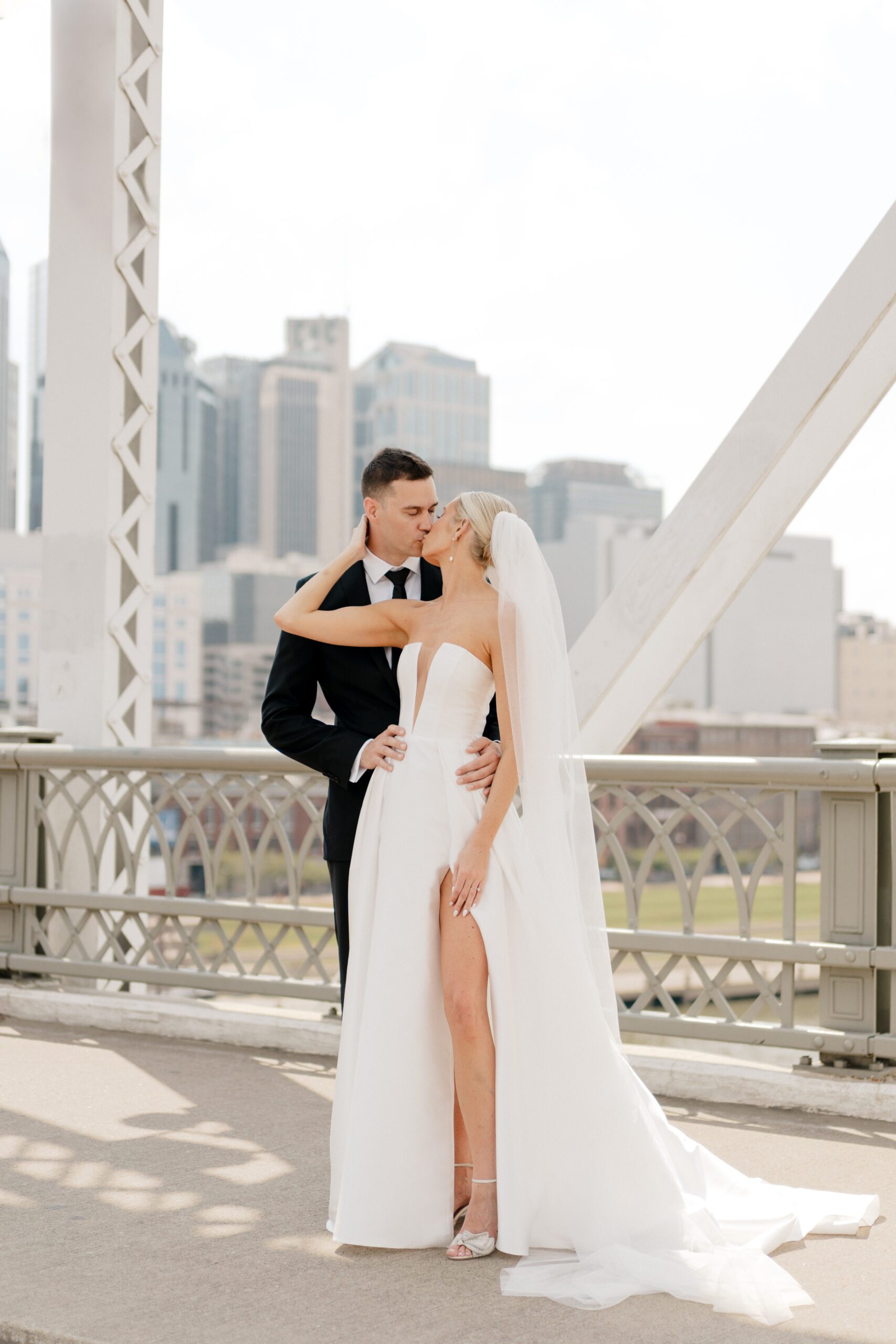 downtown nashville pedestrian bridge couples portraits before wedding ceremony