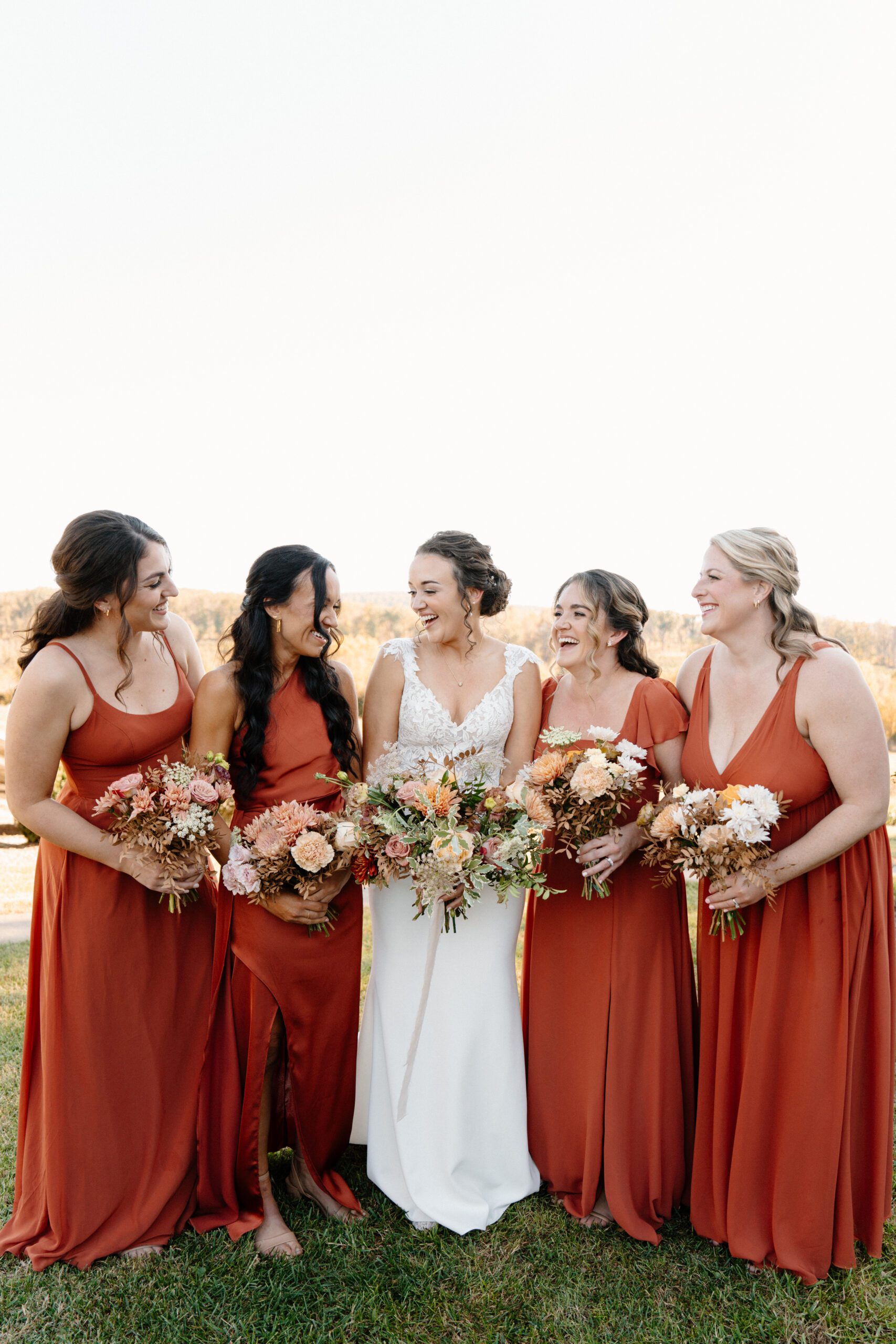 bridesmaids and bride candid photos at wedding in virginia
