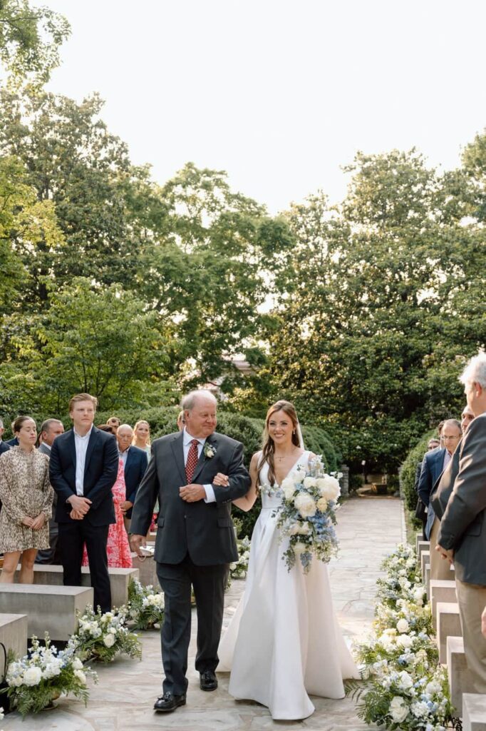 Bride and her father walking down the aisle at Belle Meade Historic Site & Winery wedding in Nashville