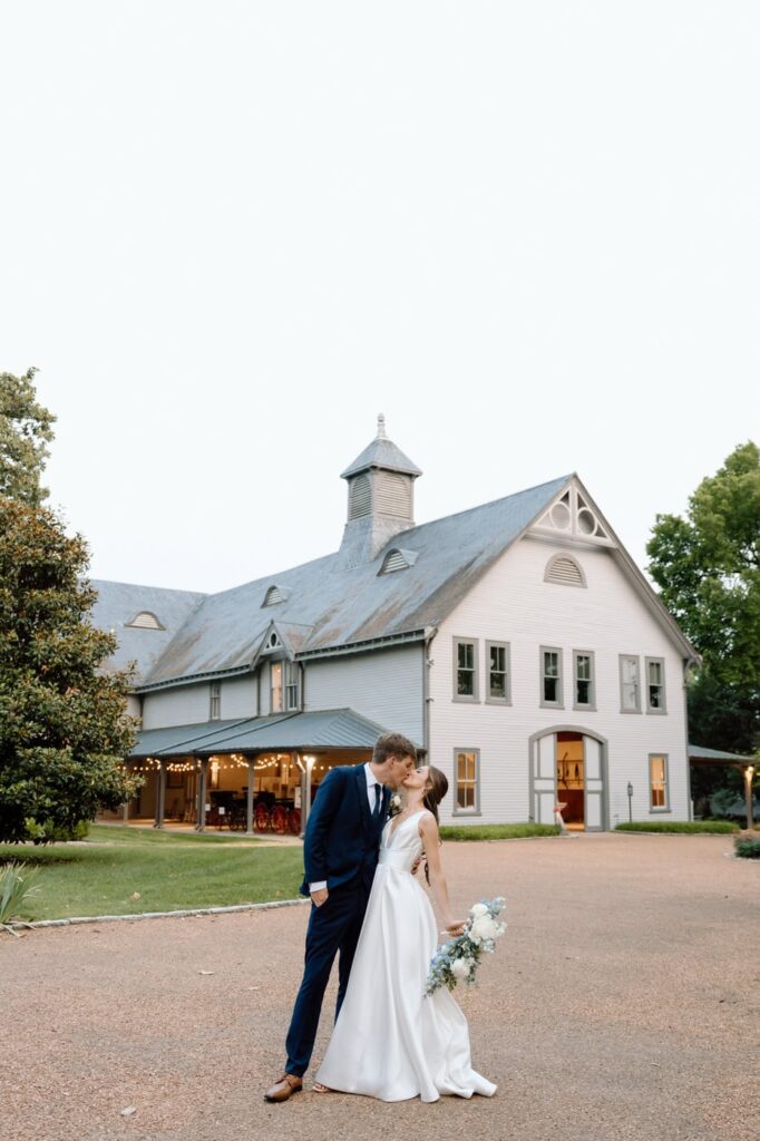 Golden hour portrait of the couple on the grounds at Belle Meade historic site & winery wedding in nashville