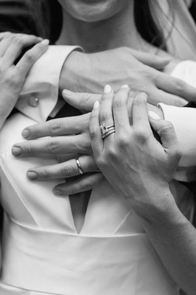 Close-up of intertwined hands during the Belle Meade wedding ceremony