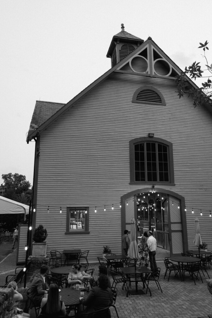 Reception tables set under soft evening light at Belle Meade