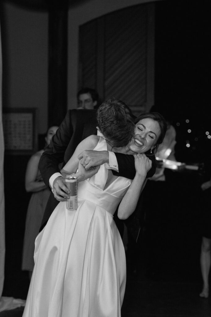 Couple laughing together during reception at Belle Meade in May