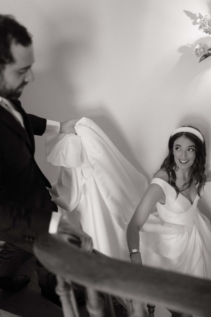 Candid moment of the couple getting ready on their wedding day
