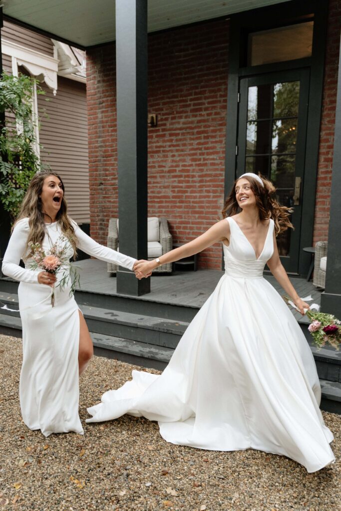 sisters laughing for candid wedding photography in nashville