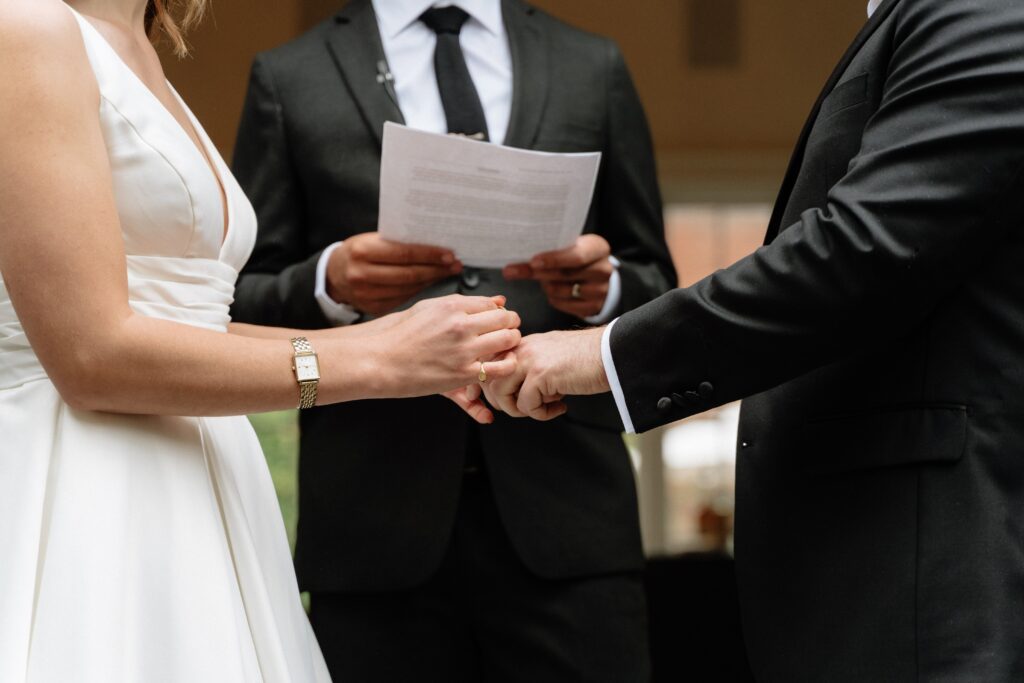 Close-up of hands during the ceremony
