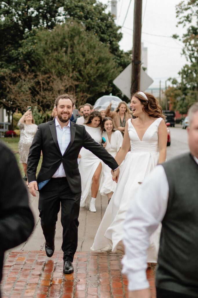 Candid portrait of the couple laughing in soft afternoon light
