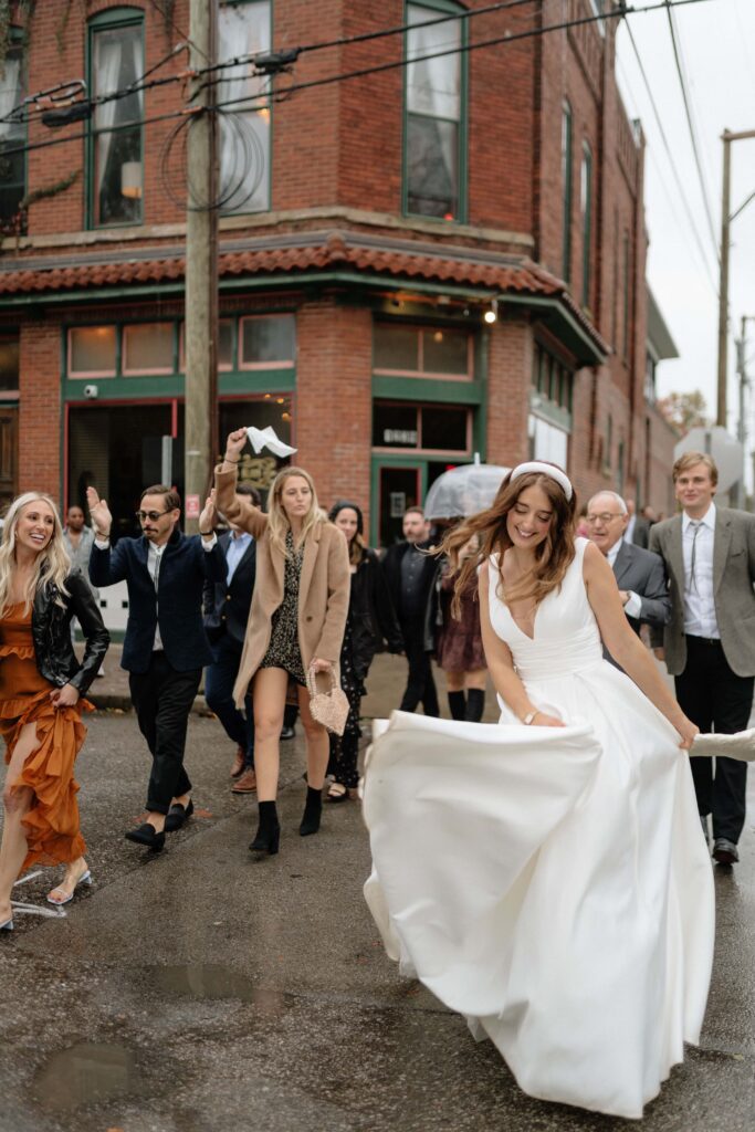 bride dancing down the streets of nashville