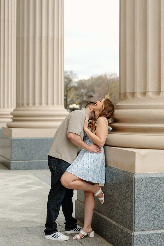 Couple laughing candidly during engagement session in nashville