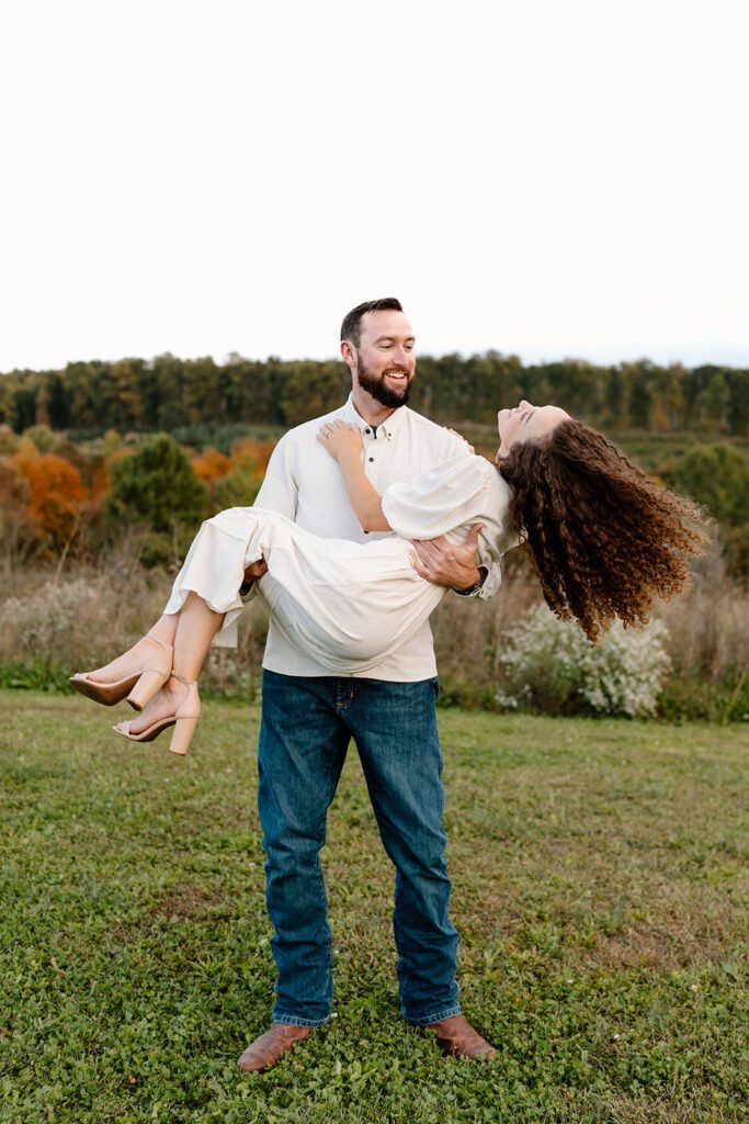 Couple laughing together during their engagement session