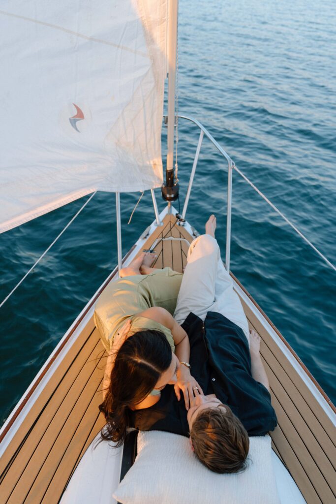 Couple wrapped together as the boat glides across Percy Priest Lake