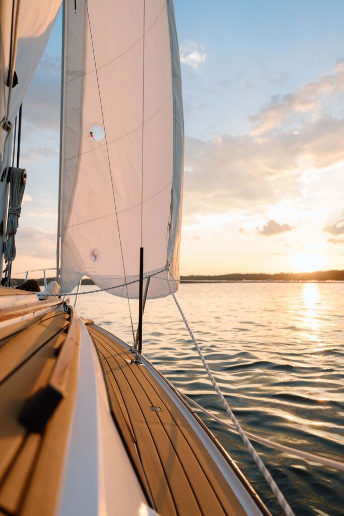 Warm golden light reflecting across Percy Priest Lake behind the couple