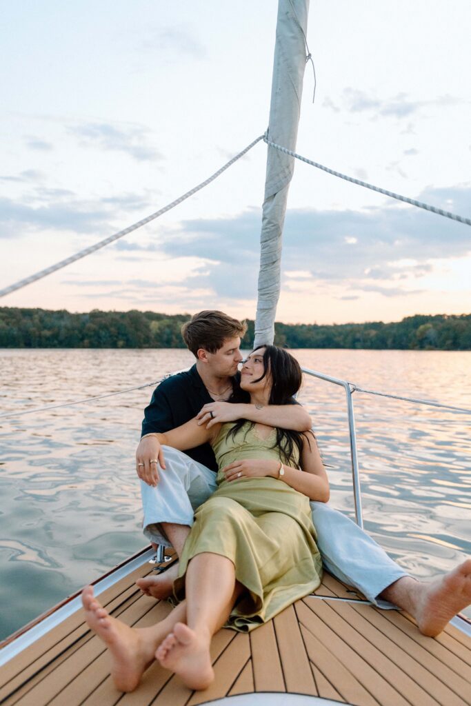 Couple wrapped together as the boat glides across Percy Priest Lake
