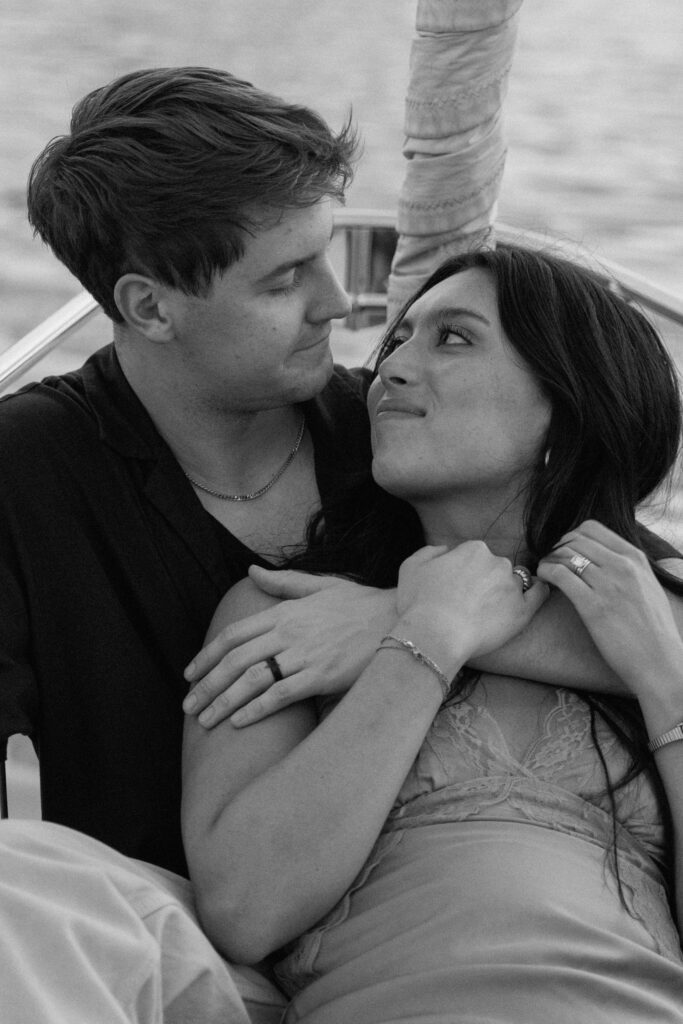 Close-up of couple leaning against the railing overlooking Percy Priest Lake
