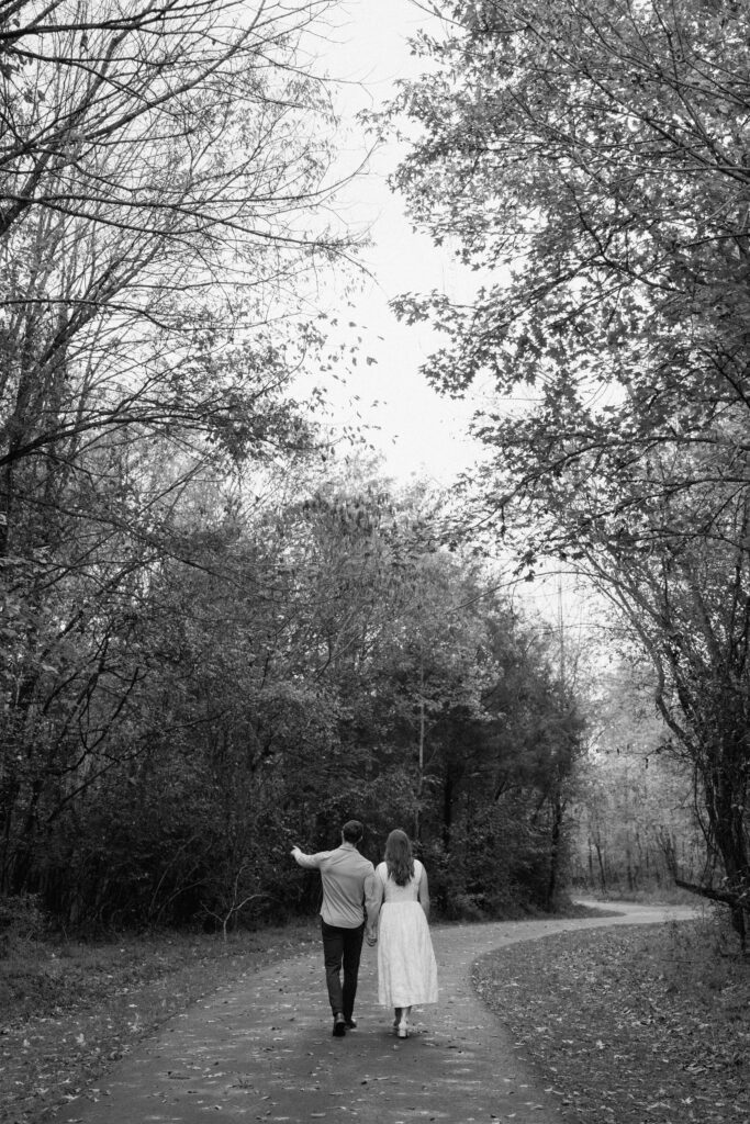 Couple walking away from the camera on the Greenway trail