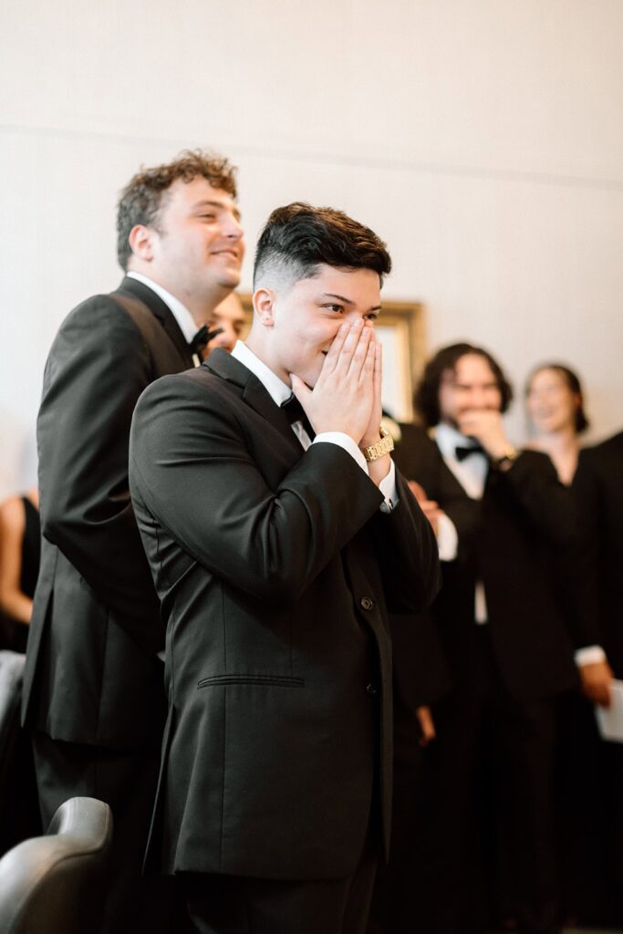 first look with the groomsmen and the bride