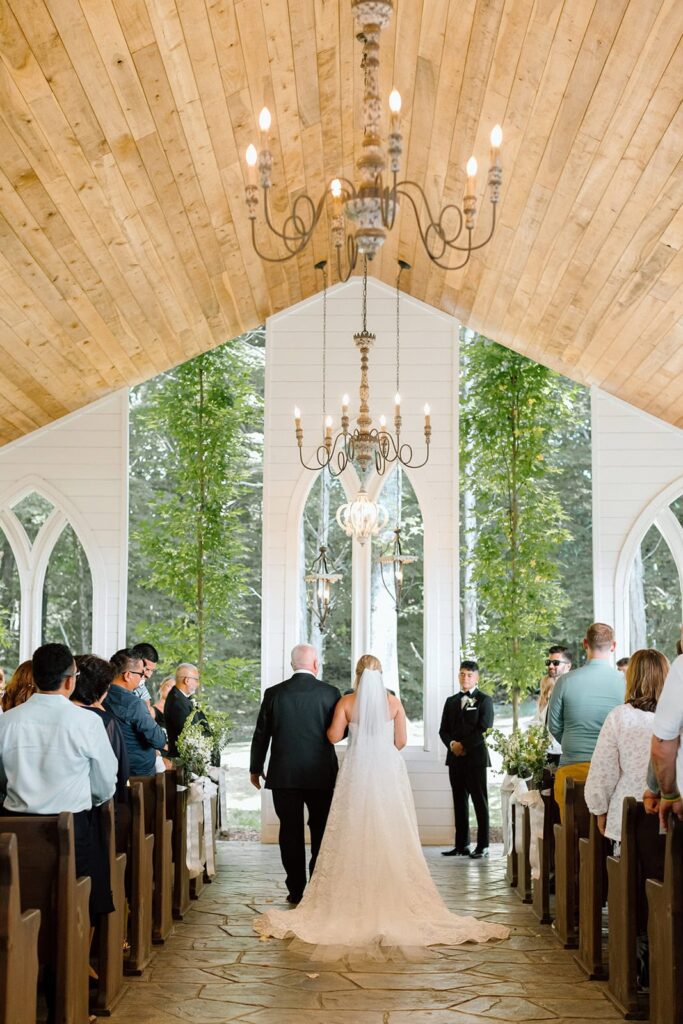 Bride and her father at the front of the aisle at the chapel at firefly lane in tennessee