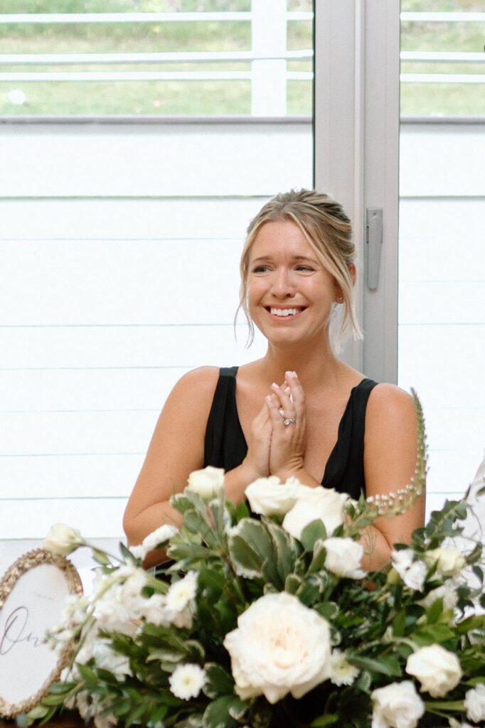 maid of honor getting emotional during the speeches at the reception