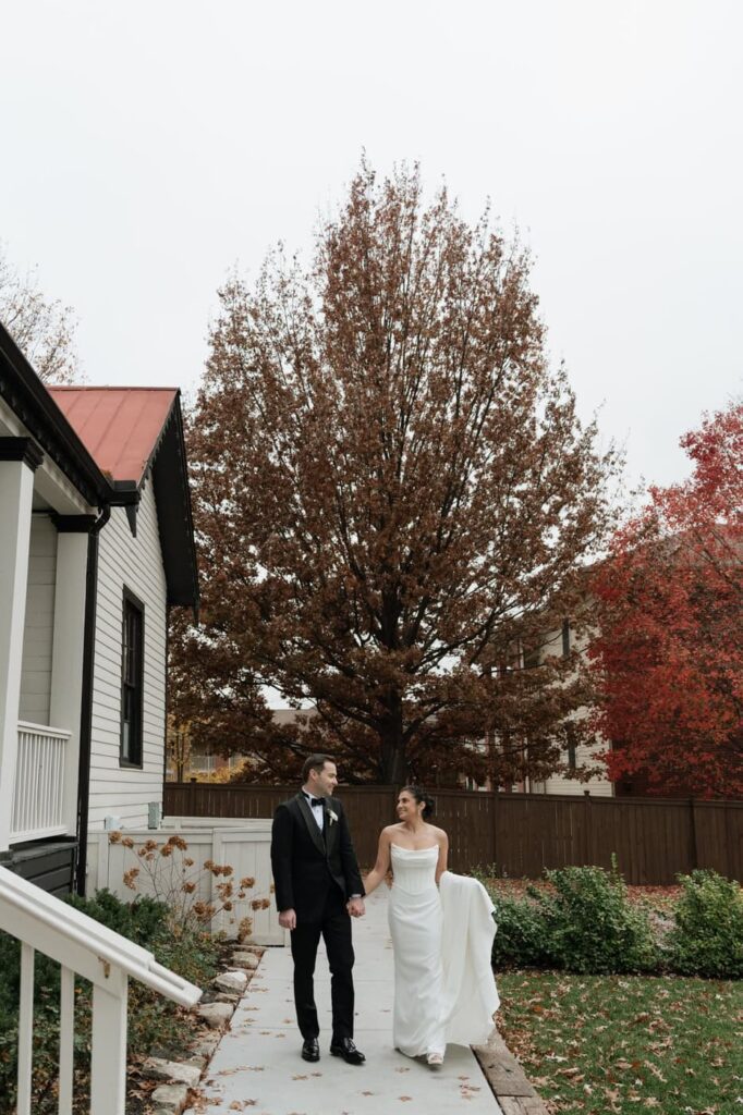 couple holding hands at estelle nashville wedding venue