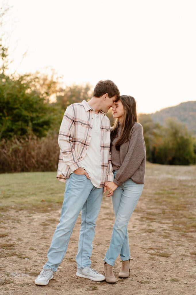 couple standing together at smith park in nashville at sunset
