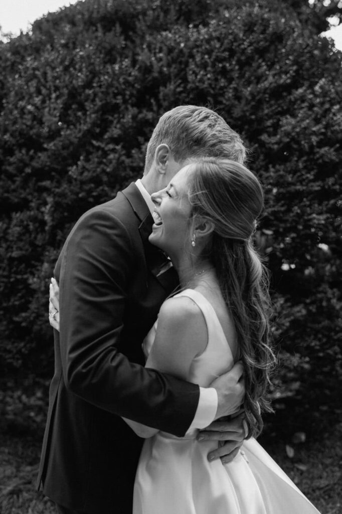 couple laughing after their first look