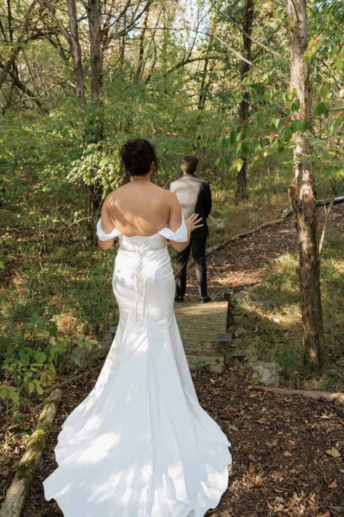 couple standing getting ready for their first look on their wedding day in nashville at drakewood farm