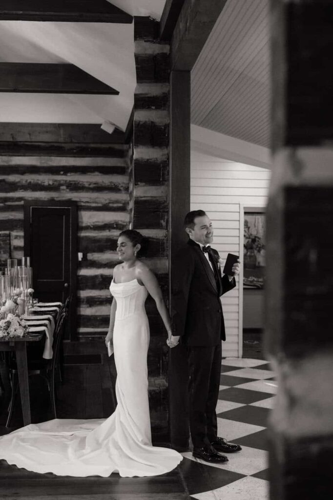 couple holding hands doing a first touch at estelle in nashville