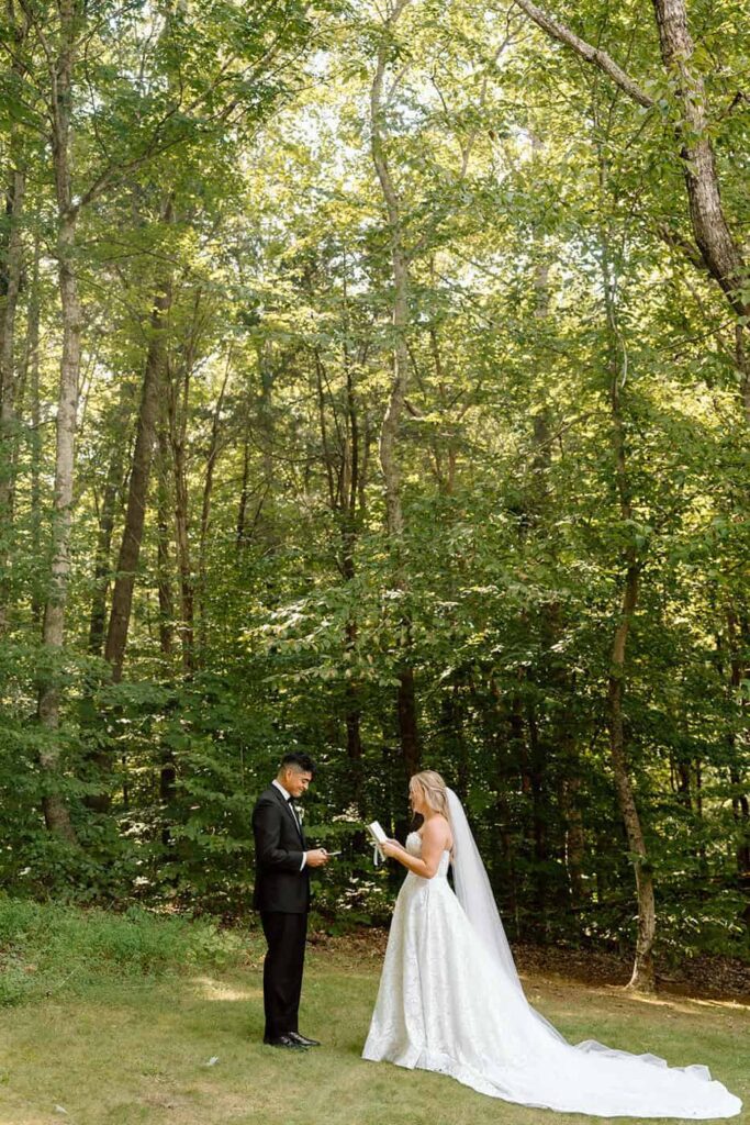 couple reading their vows after deciding on first look vs. no first look