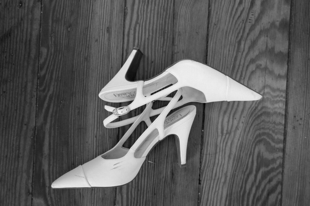 brides shoes laying on the floor