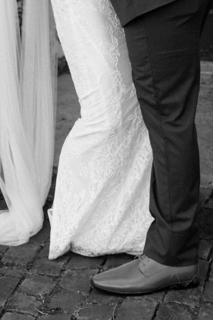 close up of bride and groom's outfits on wedding day in tennessee
