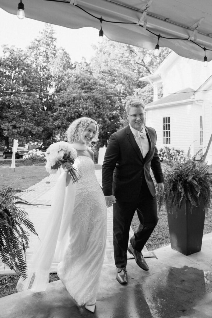 couple entering their reception at eader house venue in tennesssee