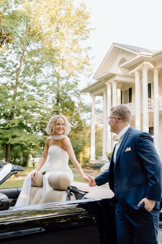 couple smiling at each other during newlywed portraits at tennessee wedding venue
