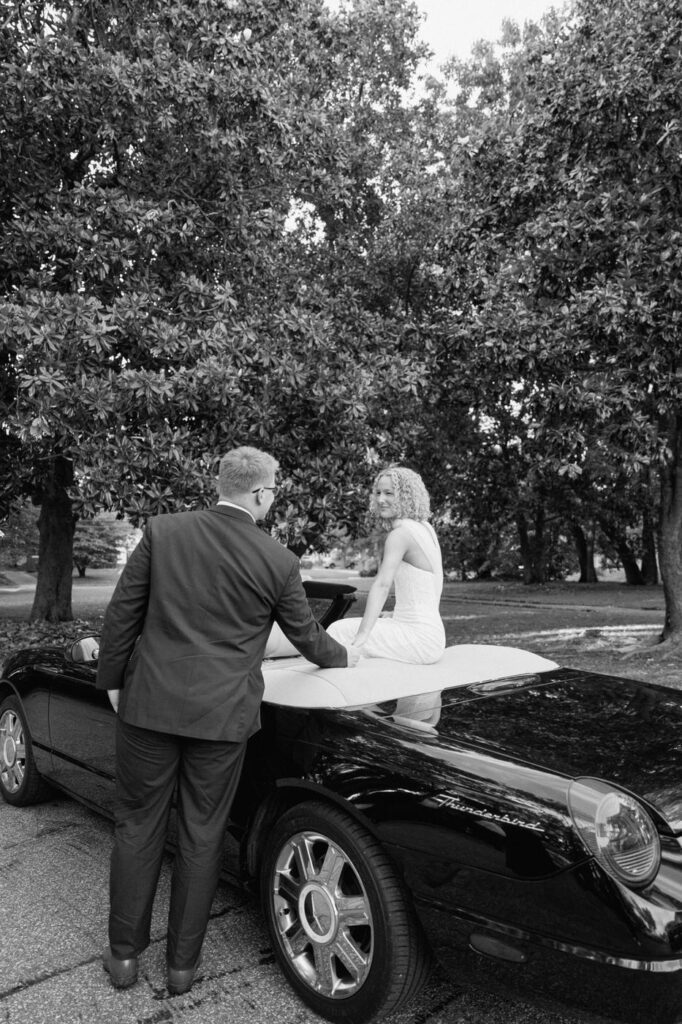 bride and groom at their getaway car in nashville