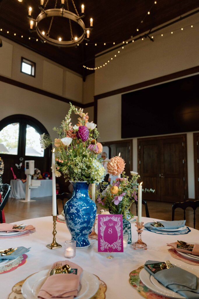 close up of table decor with lots of color at huntsville wedding