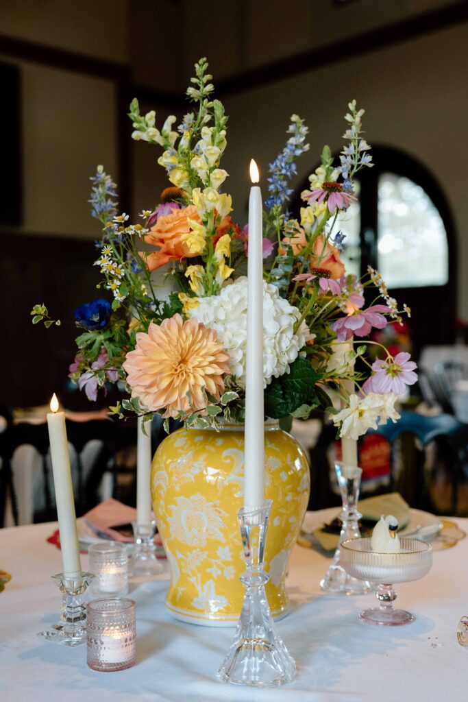 table scapes at huntsville botanical garden wedding with a lot of bright color