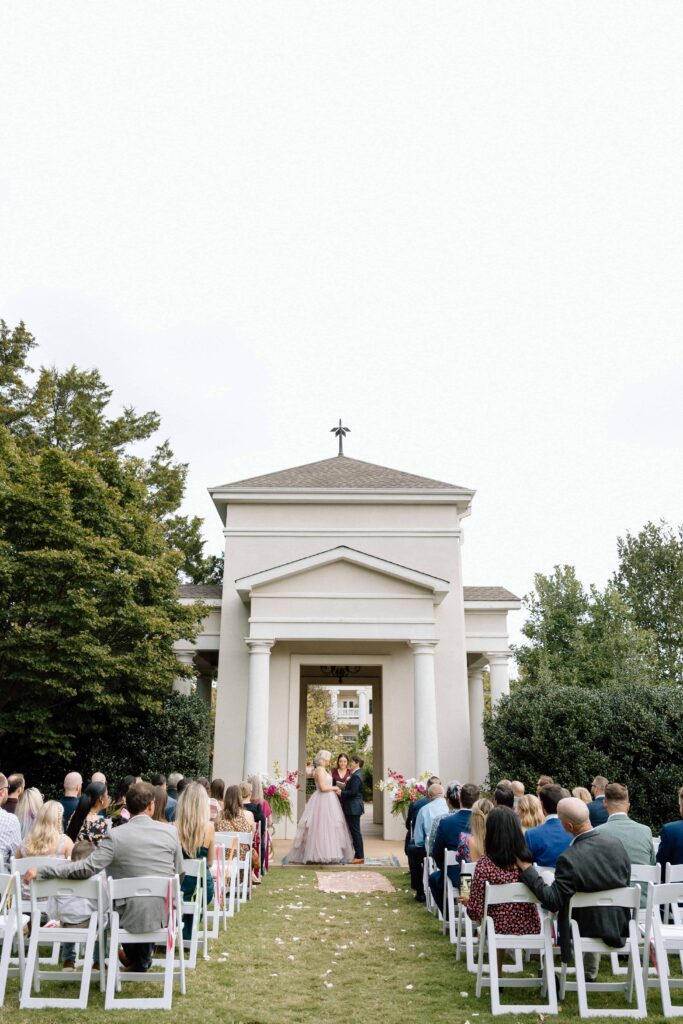 ceremony space at huntsville botanical garden where couple is saying their vows