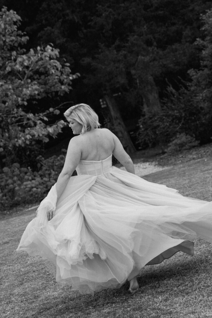 motion photo of the bride running around in her dress