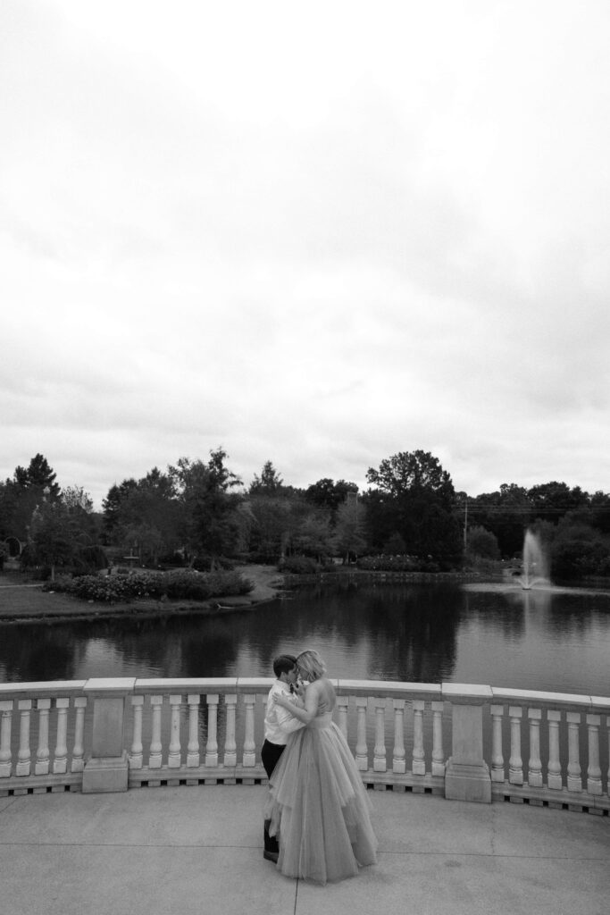 sweet candid moment of couple dancing outside at huntsville botanical garden