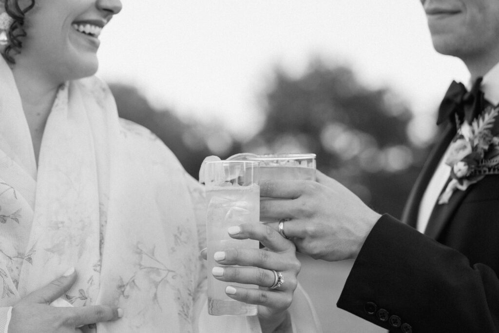 couple cheersing their glasses after getting married in nashville