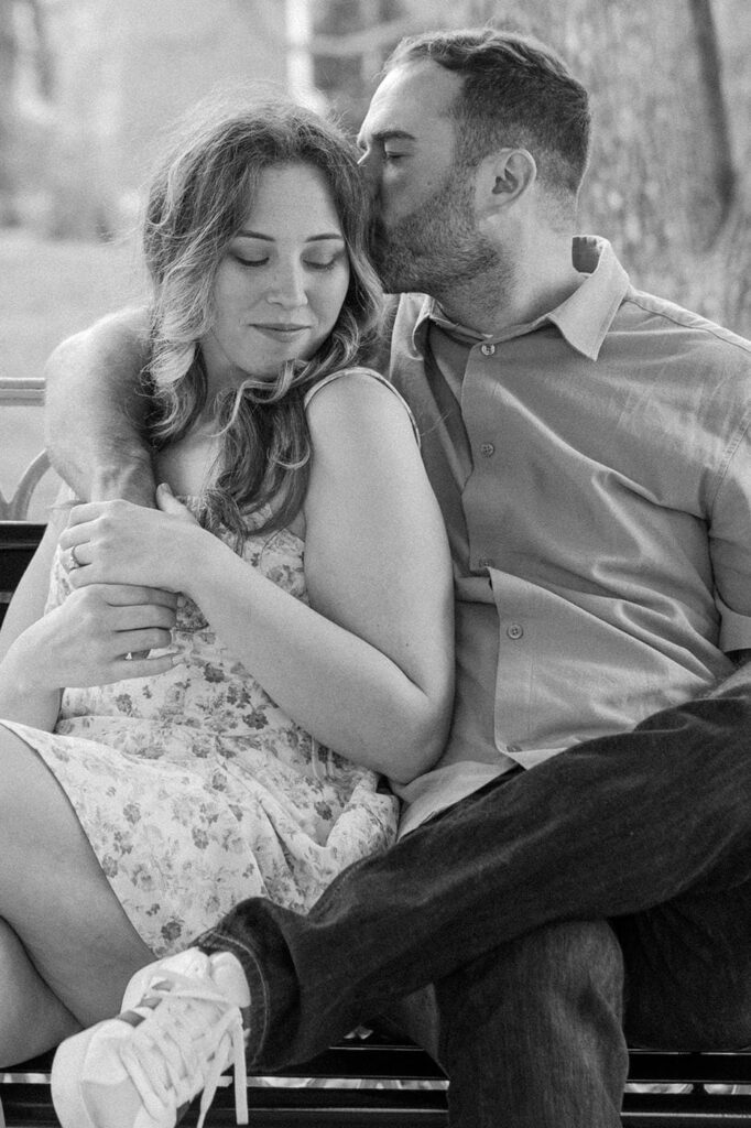 sweet moment of couple embracing at belmont campus in nashville