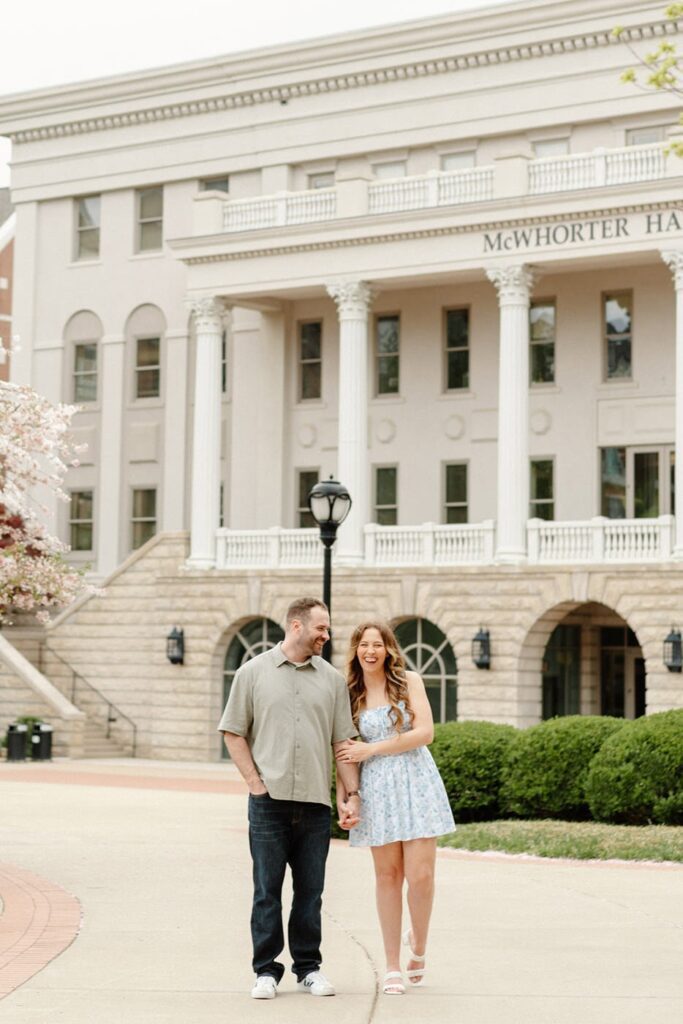 couple holding hands during nashville engagement photo session