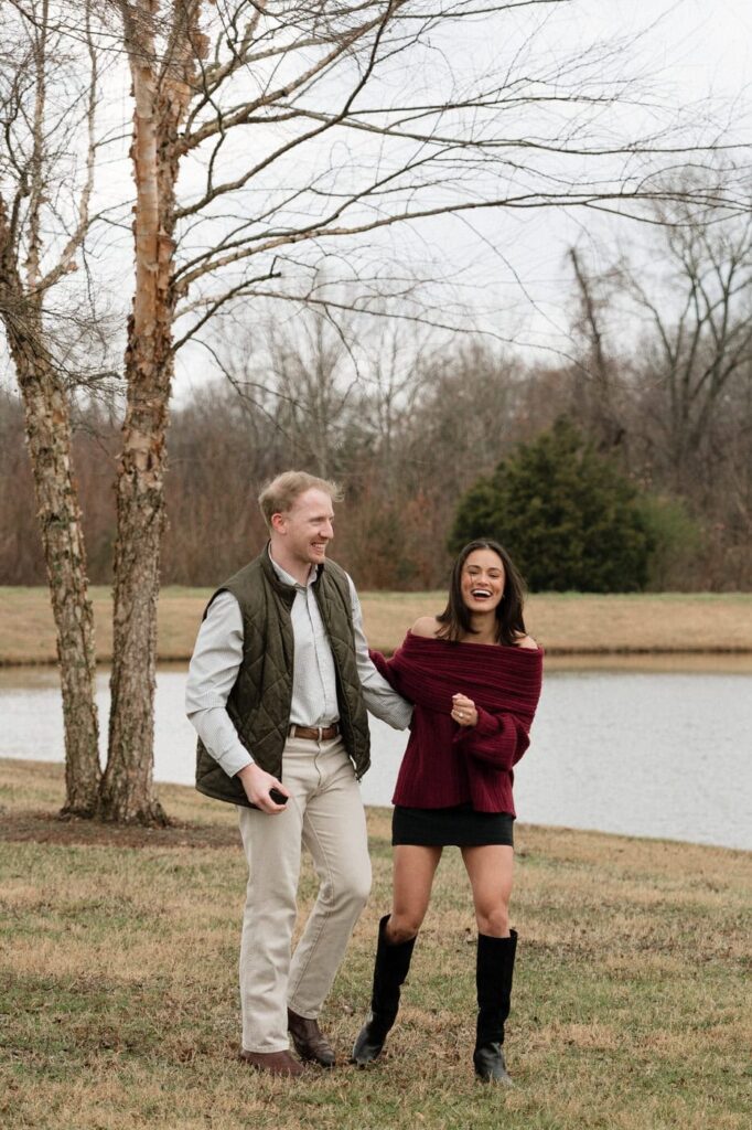 couple laughing after surprise proposal in franklin tennessee