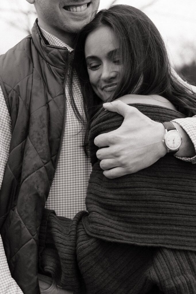 couple embracing after proposal at harlinsdale farm in tennessee