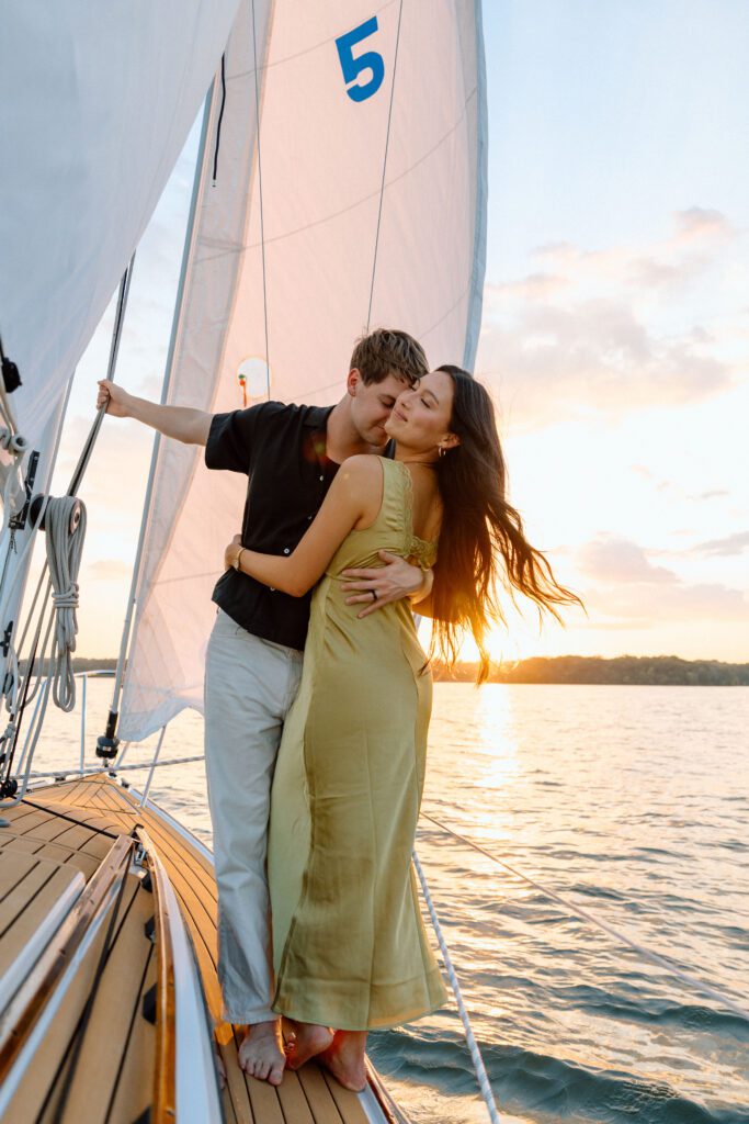 sunset sailboat session for engagement in nashville