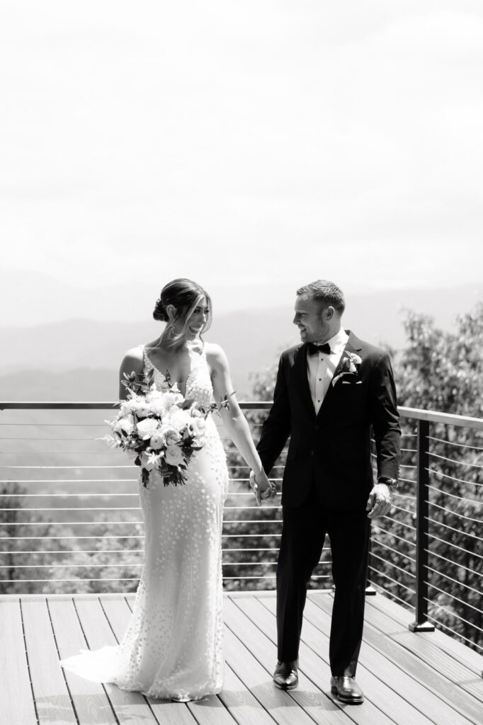 couple holding hands before their wedding in gatlinburg tennessee