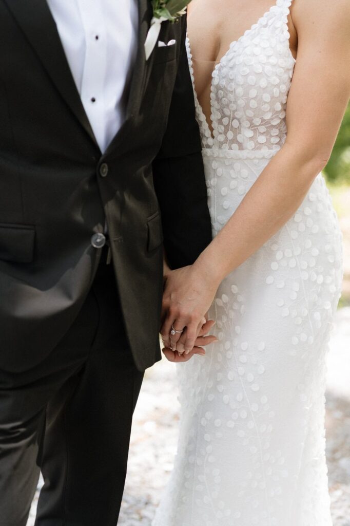 close up of couple holding hands in the great smoky mountains