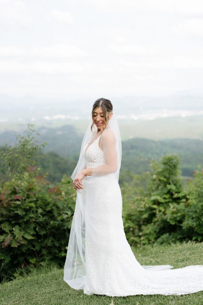 bride posing in great smoky mountains national park on her wedding day