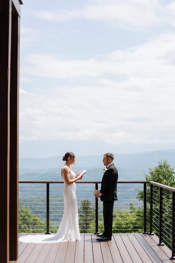 couple reading their vows privately before gatlinburg wedding