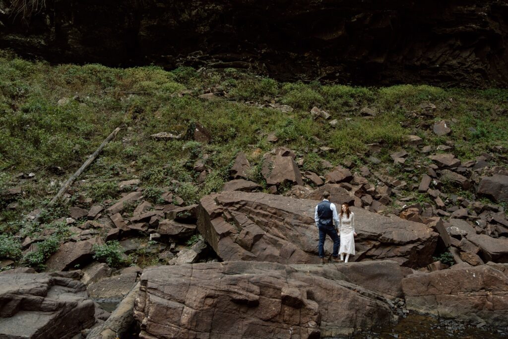 couple hiking during their tennessee elopement in october