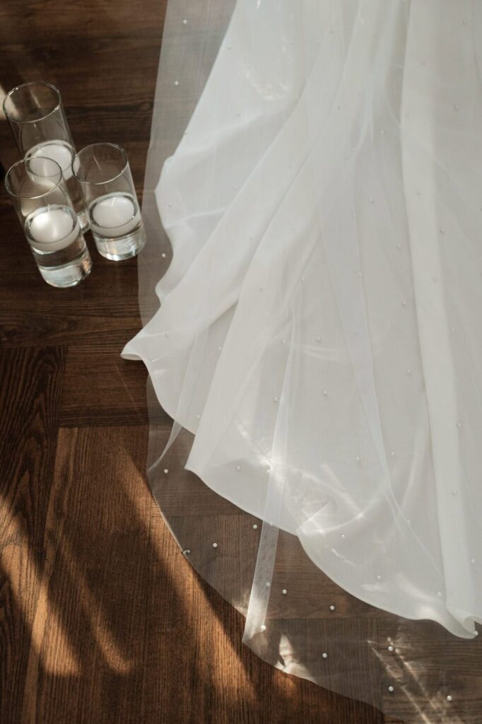 detail shot of brides dress during first look at nashville wedding